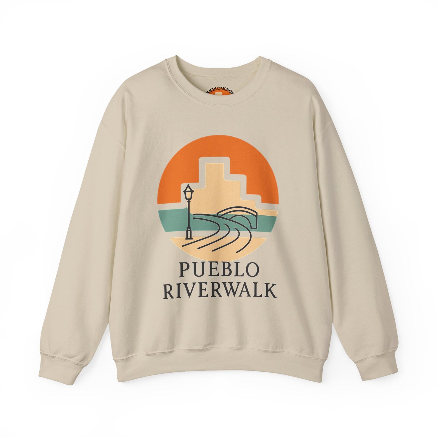 Sand color crewneck sweatshirt with Pueblo Riverwalk sunrise graphic design on front, displayed on white background.