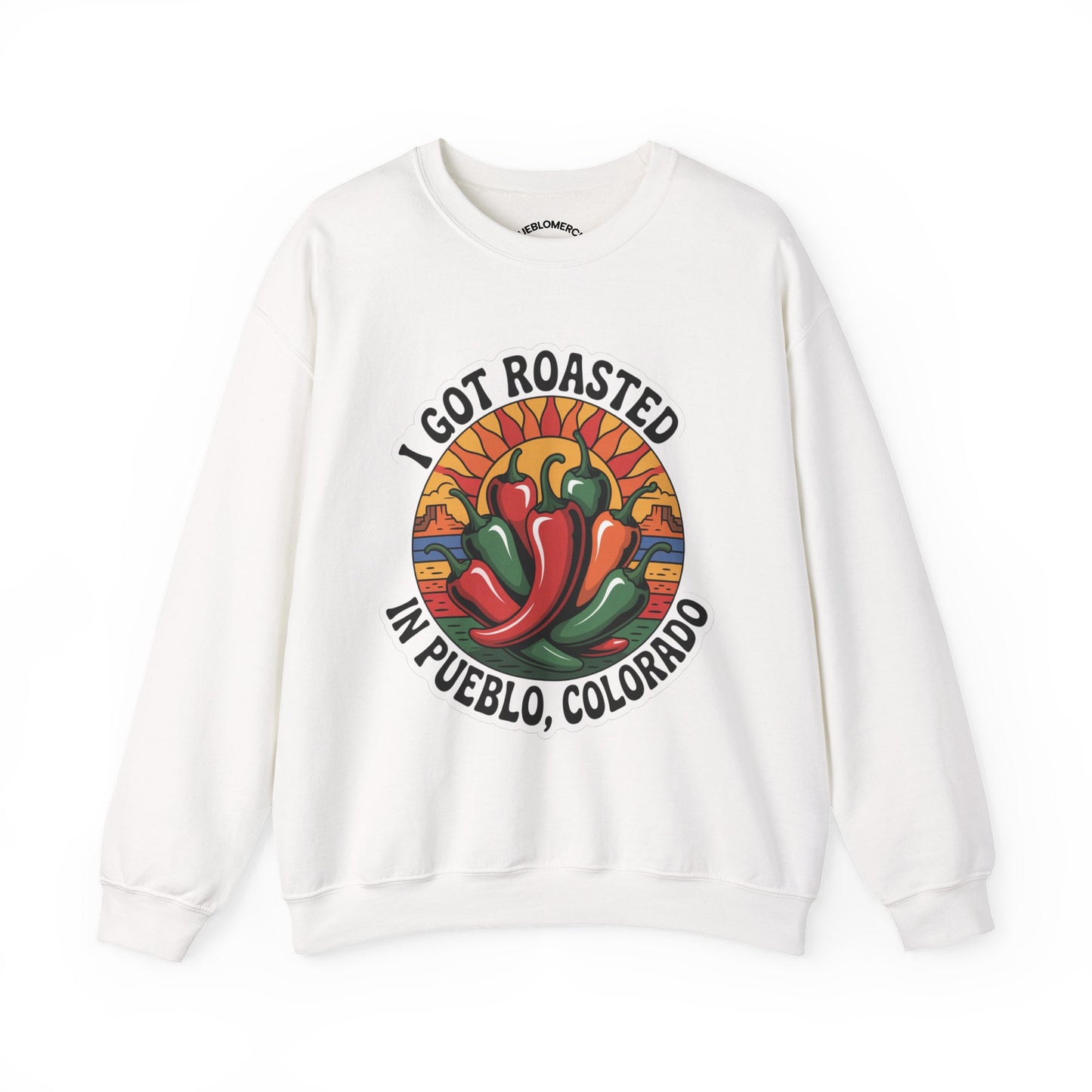 Sand color sweatshirt with Pueblo roasted chilis graphic and ‘I Got Roasted in Pueblo, Colorado’ text on front on white background