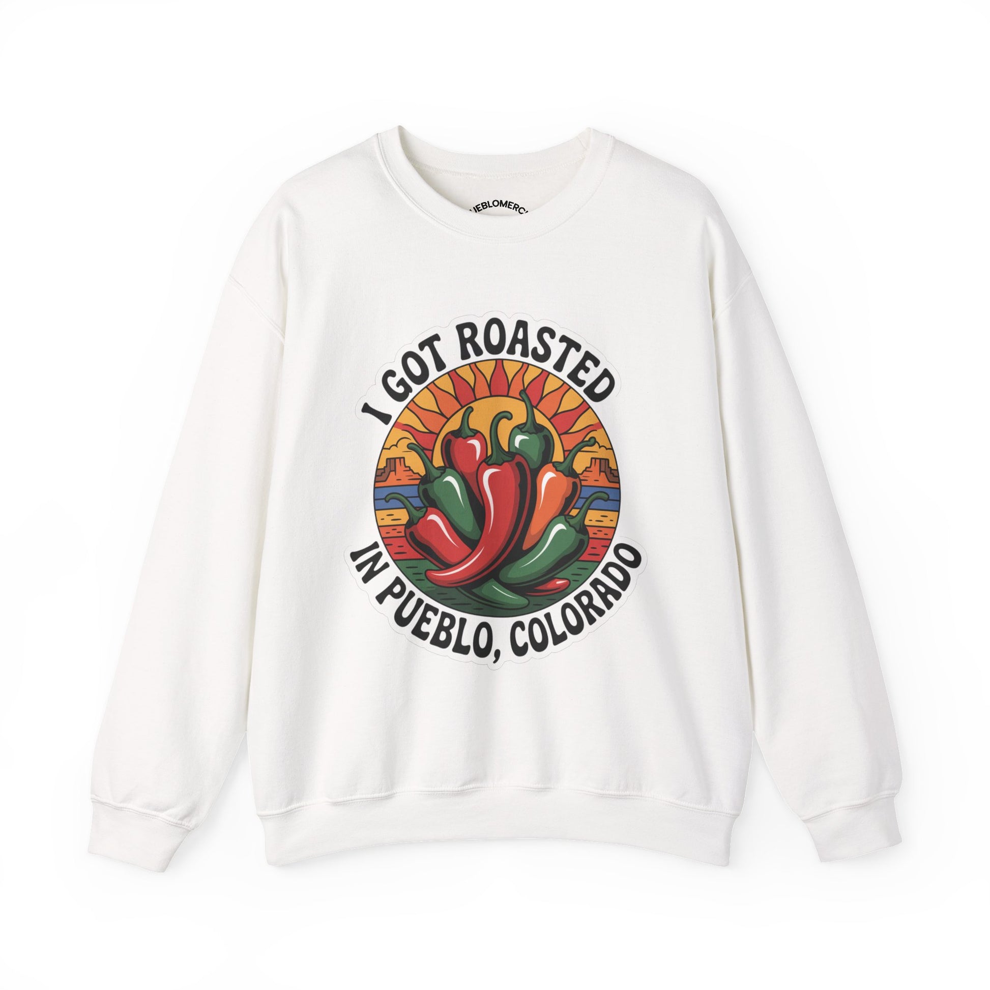 Sand color sweatshirt with Pueblo roasted chilis graphic and ‘I Got Roasted in Pueblo, Colorado’ text on front on white background